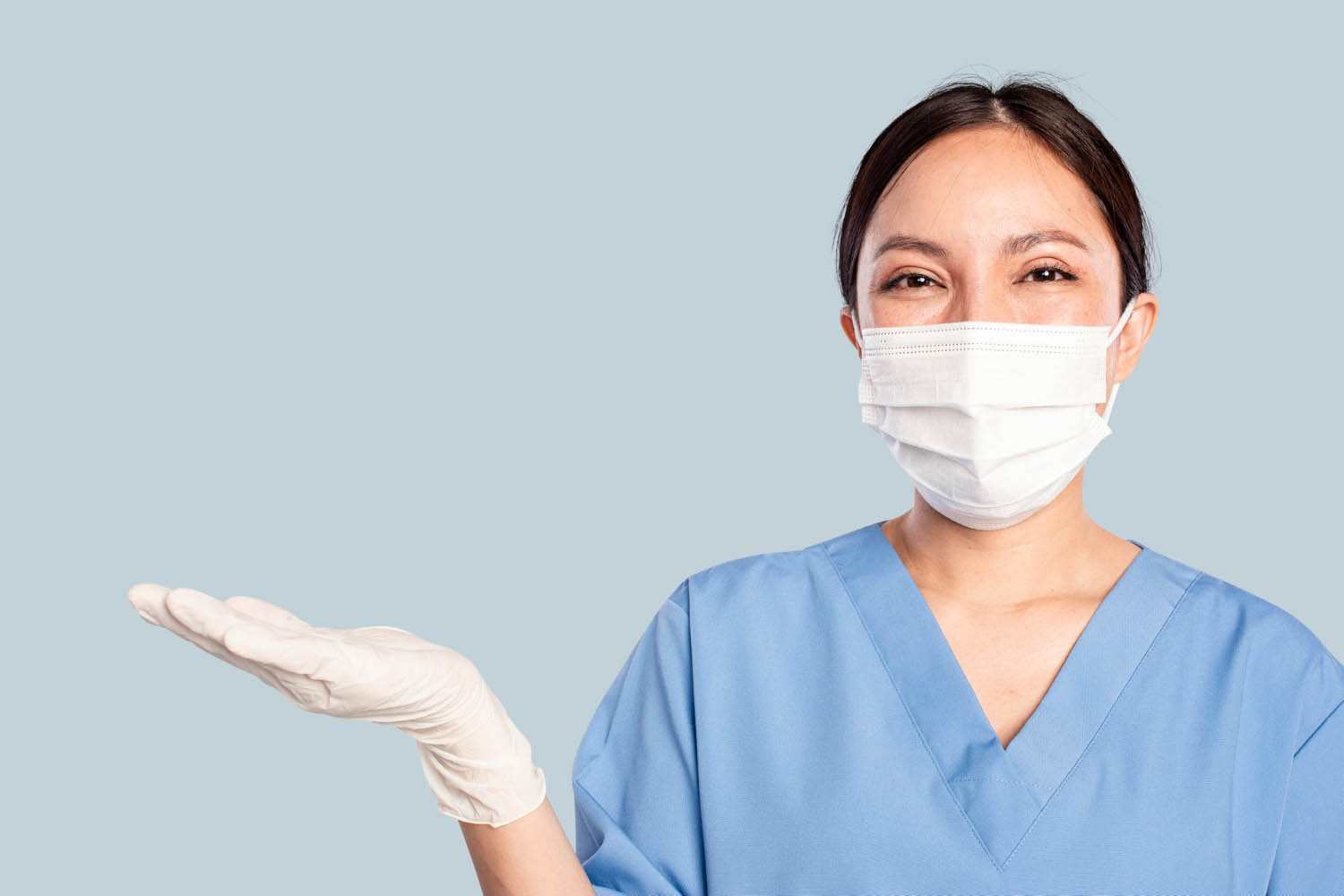 female-doctor-with-presenting-hand-gesture