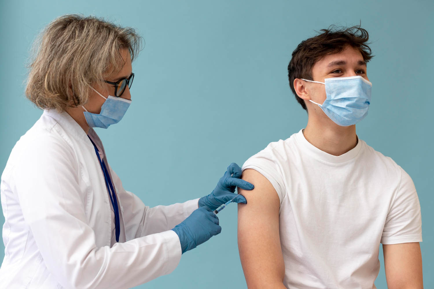 medium-shot-man-getting-vaccine